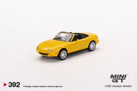 
              Mini GT - Mazda Miata MX-5 (NA) Sunburst Yellow
            